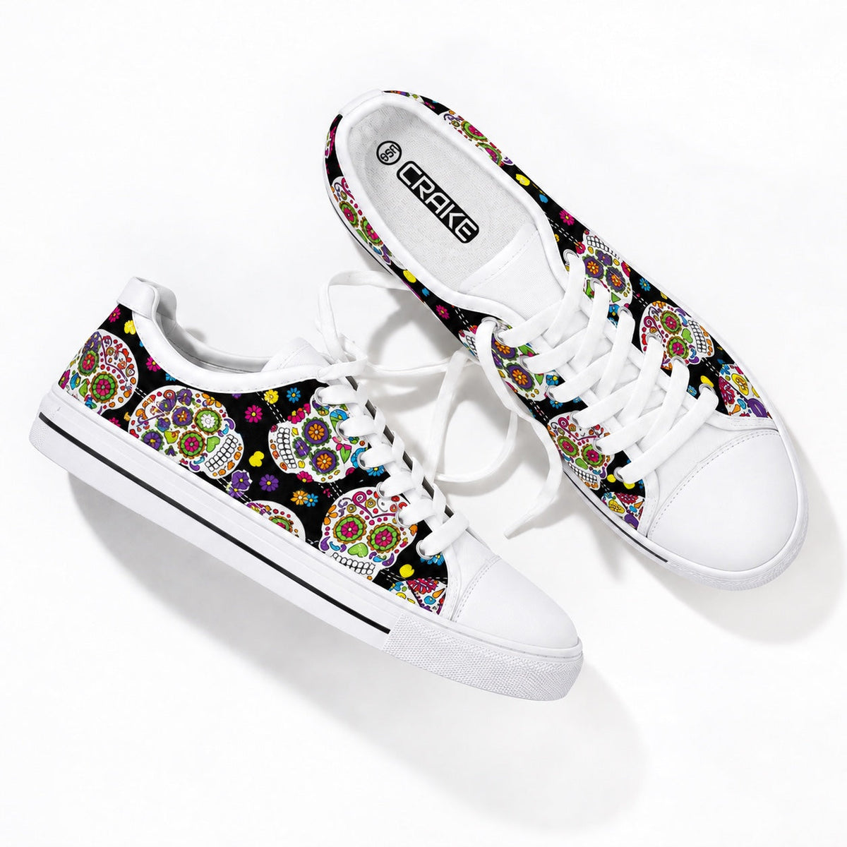 Crake Fancy Skulls sneakers in the original diagonal pair arrangement, with the thin black stripe along the white outsoles