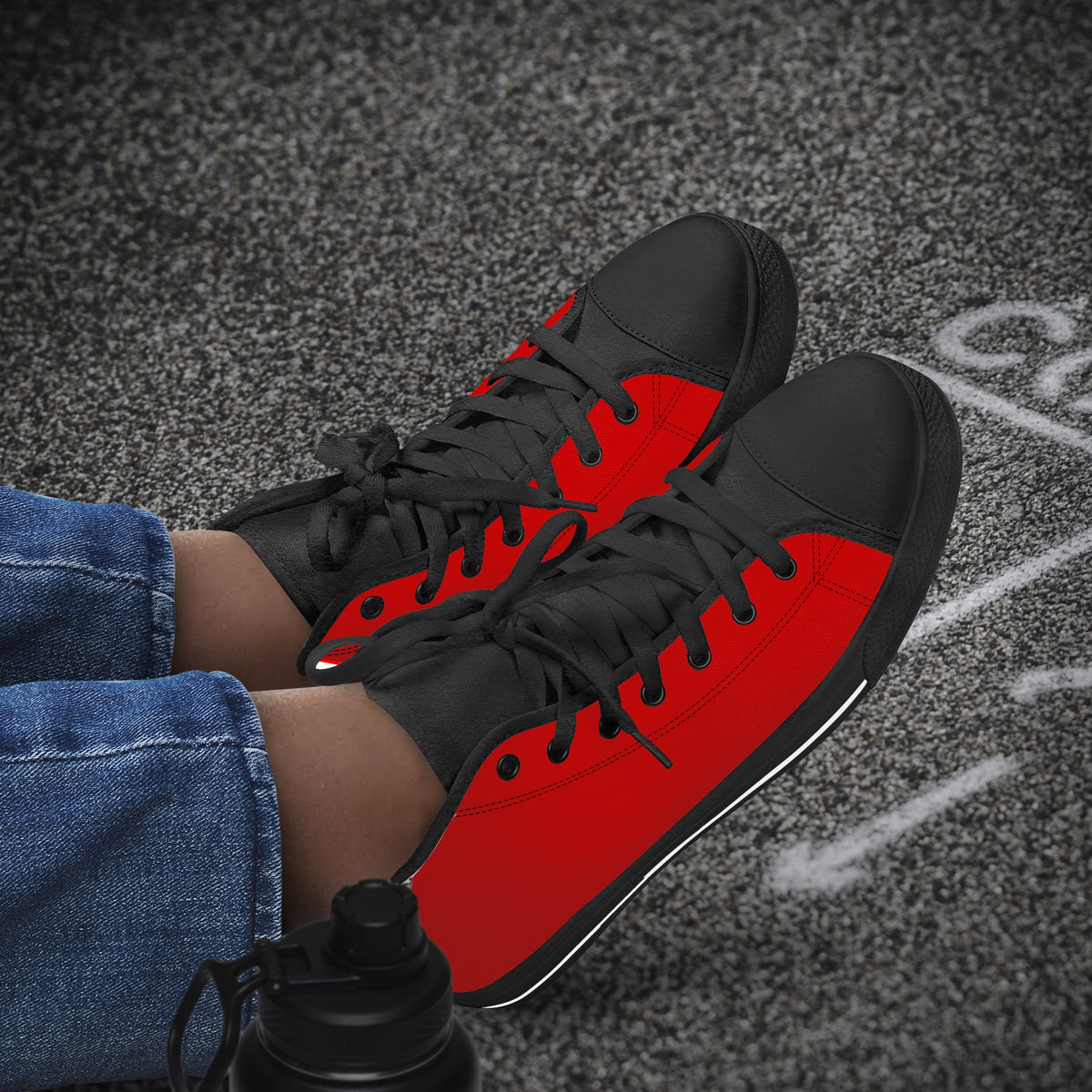Crake High Top Red Sneaker with black trim worn with jeans outdoors