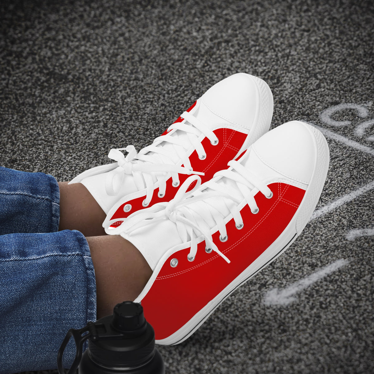 Crake High Top Red Sneaker with white trim worn with jeans outdoors