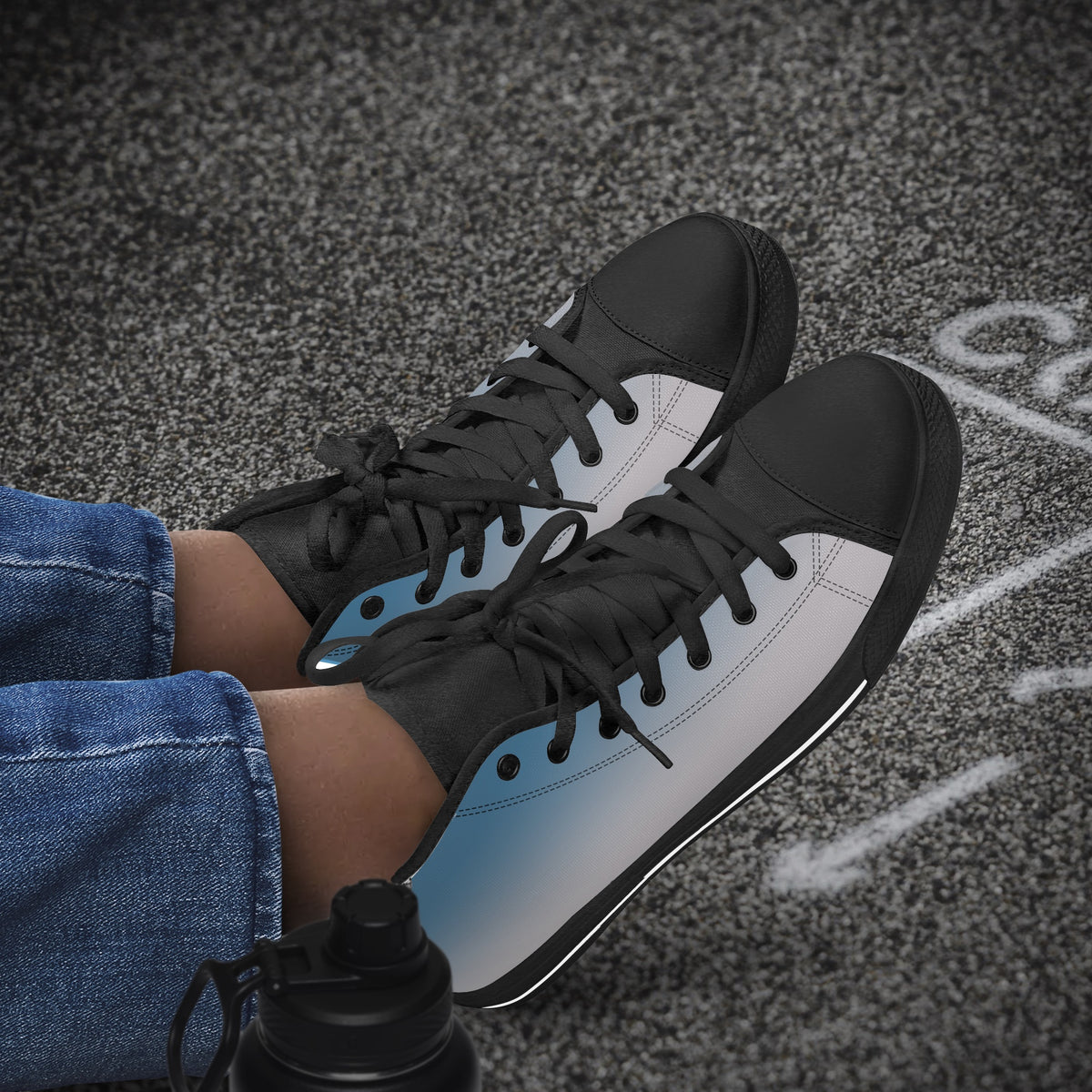 Crake High Top Sky Sneaker with black trim worn with jeans outdoors