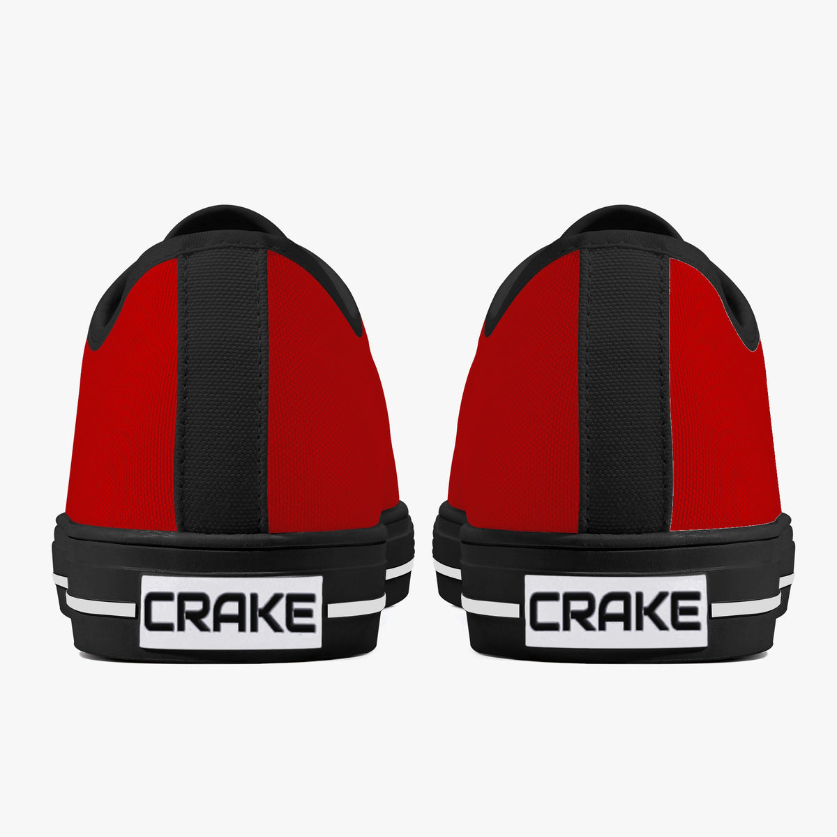 Rear view of Crake Low Top Red Sneaker pair with black heel stripe and Crake logo